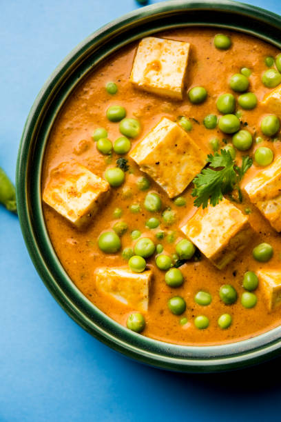 istock Green peas or matar paneer curry recipe, served in a bowl. selective focus 1077987792