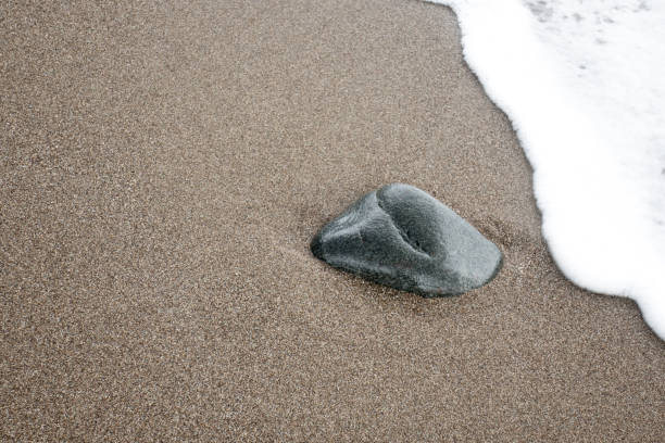 Pebble on Sandy Iztutzu Beach with Soft Wave Behind, Turkey