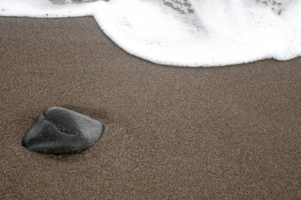 istock Pebble on Sandy Iztutzu Beach with Soft Wave Behind, Turkey 1077988016