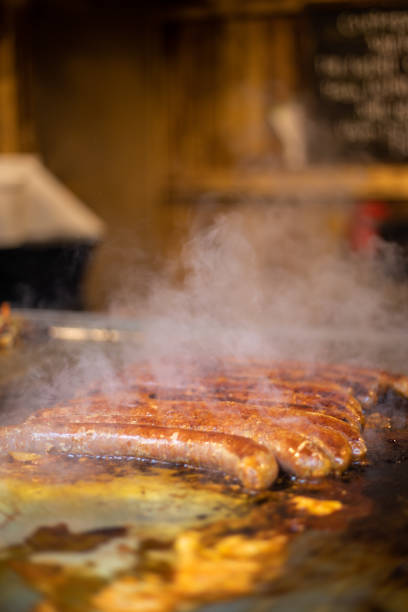Sausages Cooking On Grill. Street Food Market in Budapest