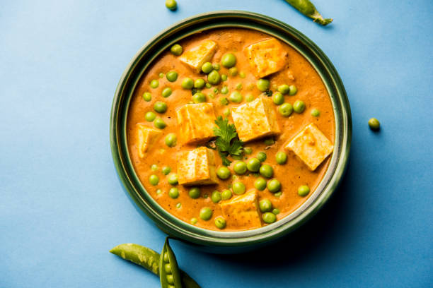 istock Green peas or matar paneer curry recipe, served in a bowl. selective focus 1077988930