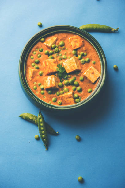 istock Green peas or matar paneer curry recipe, served in a bowl. selective focus 1077989000