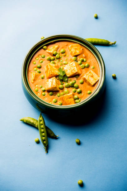 istock Green peas or matar paneer curry recipe, served in a bowl. selective focus 1077989318