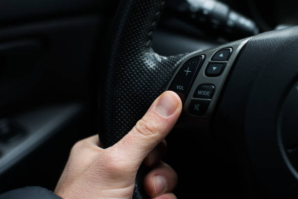 istock Hand on the steering wheel, close-up 1077990688