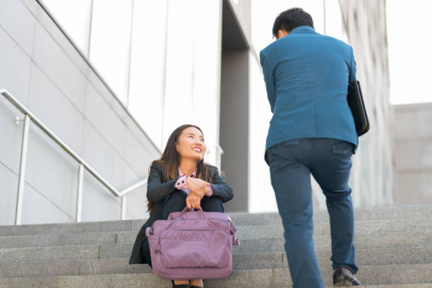 istock Business people discussing on stairs 1077996378