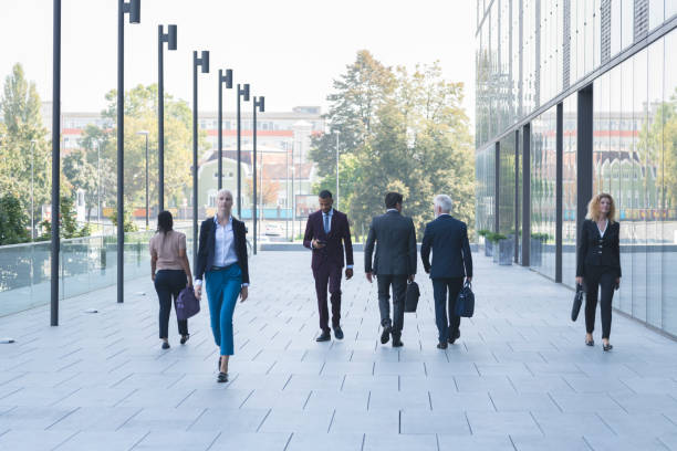 istock Business people walking at outdoors 1077996380