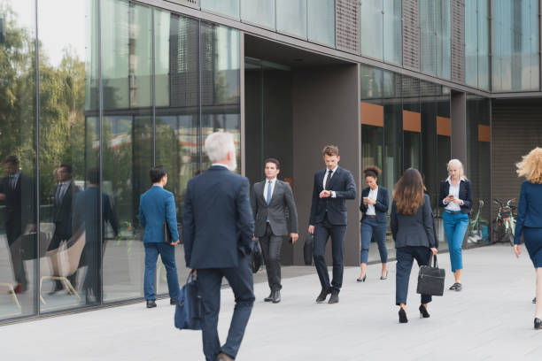 istock Business people walking at outdoors 1077996428