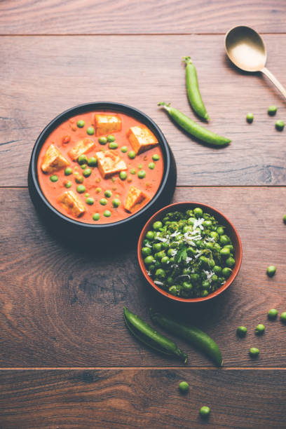 istock Green peas or matar paneer curry recipe, served in a bowl. selective focus 1077996886