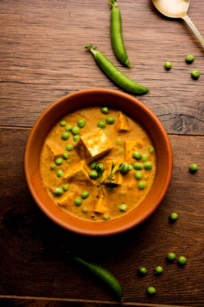 istock Green peas or matar paneer curry recipe, served in a bowl. selective focus 1077998770