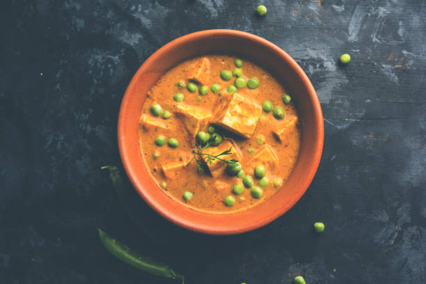 istock Green peas or matar paneer curry recipe, served in a bowl. selective focus 1077999214