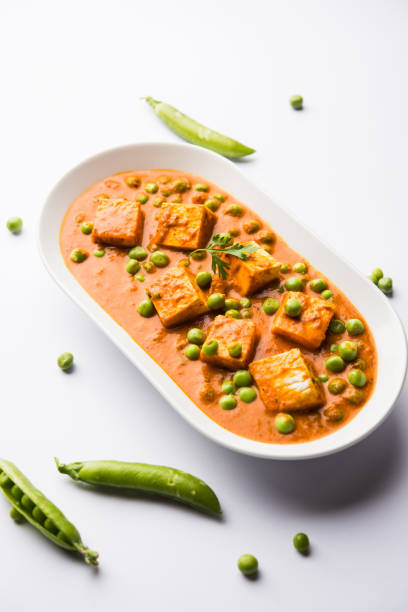 istock Green peas or matar paneer curry recipe, served in a bowl. selective focus 1077999634