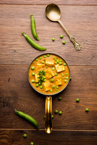 istock Green peas or matar paneer curry recipe, served in a bowl. selective focus 1078001476