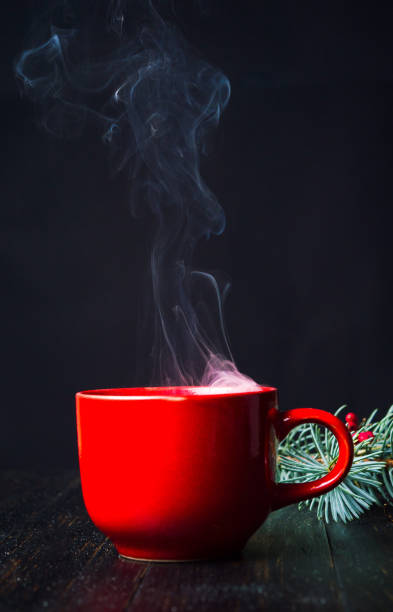 istock Winter cup of coffee smoking on the table 1078006542