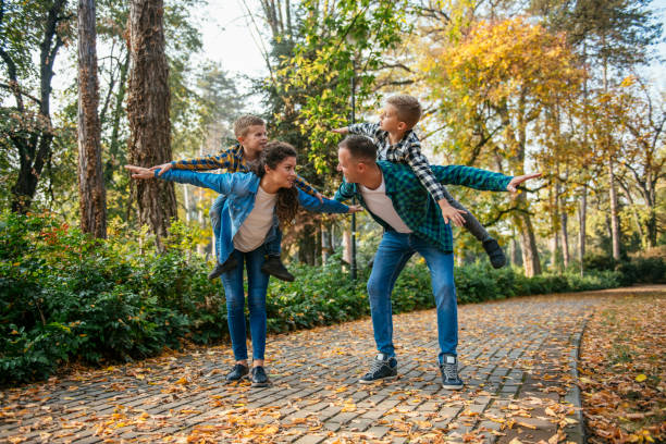 istock Happy family in the park 1078006686