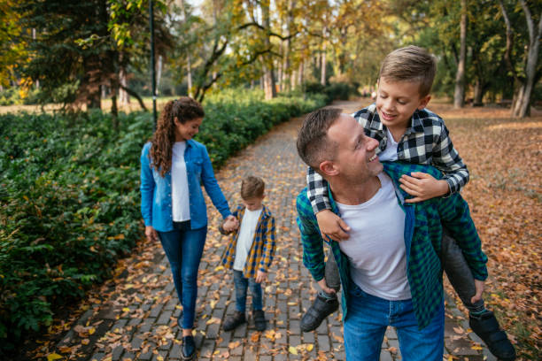 istock Happy family outdoors having fun 1078008684