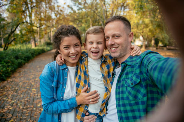 istock Happy family outdoors having fun 1078008978