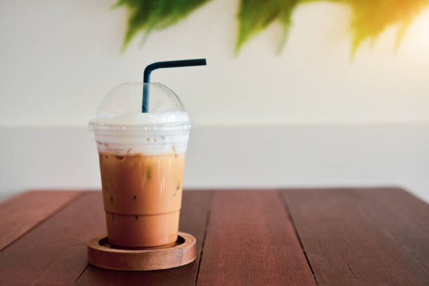istock ice coffee on wooden table at coffee time 1078011536