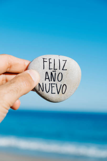istock stone with the text happy new year in spanish 1078015284