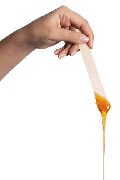 istock Honey wax on a spatula - Isolated 1078015394
