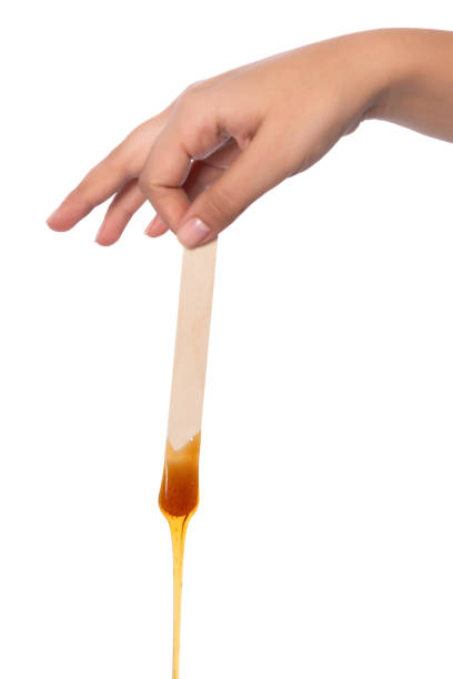 istock Honey wax on a spatula - Isolated 1078015408