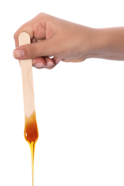 istock Honey wax on a spatula - Isolated 1078015412