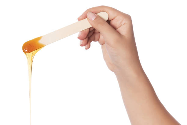 istock Honey wax on a spatula - Isolated 1078015422