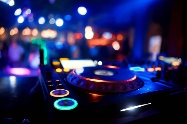 istock DJ playing music at mixer closeup 1078024568
