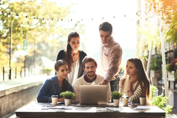 istock Completing a team task at a local coffee shop 1078026086