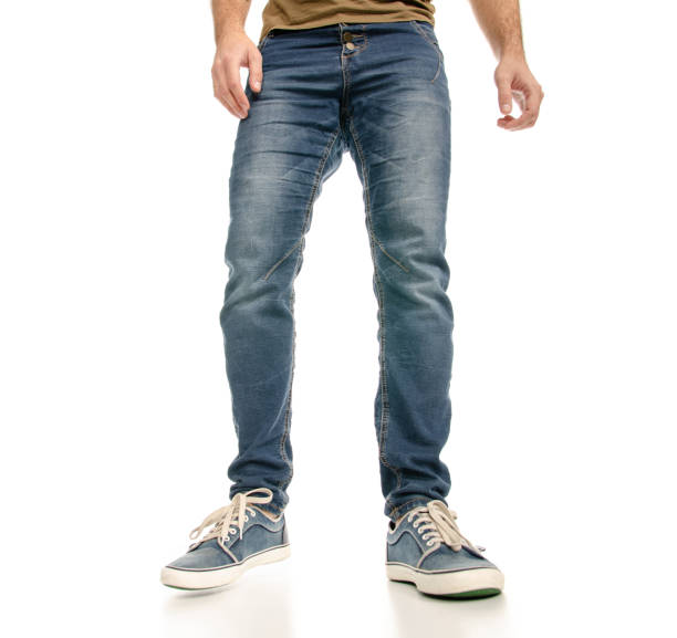 istock Man legs feet jeans sneakers 1078031746