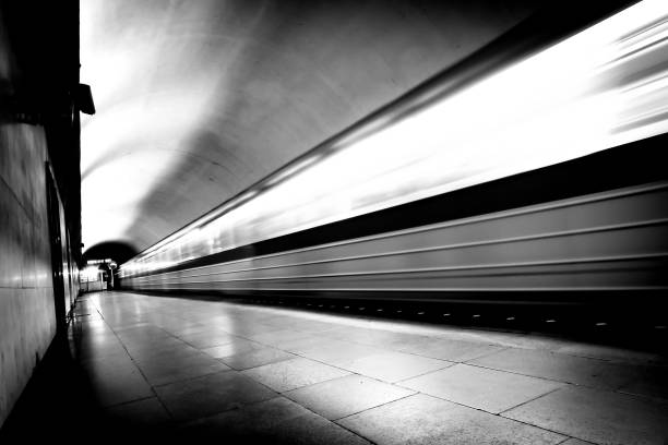 istock Moving train in the subway. Train silhouette in black and white. Moving train. 1078039918