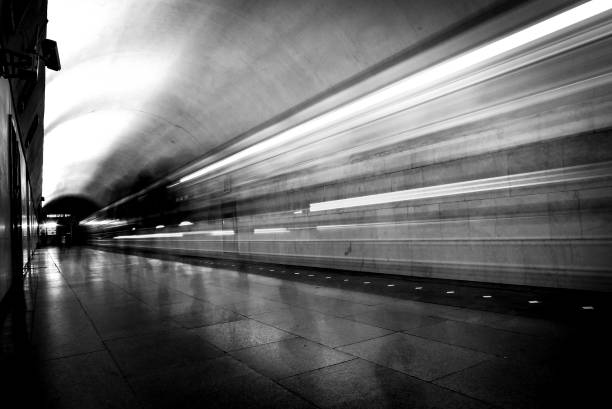 istock Moving train in the subway. Train silhouette in black and white. Moving train. 1078039924