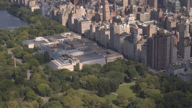 istock AERIAL: Flying above Upper East side overlooking green Central park in New York 1078044150
