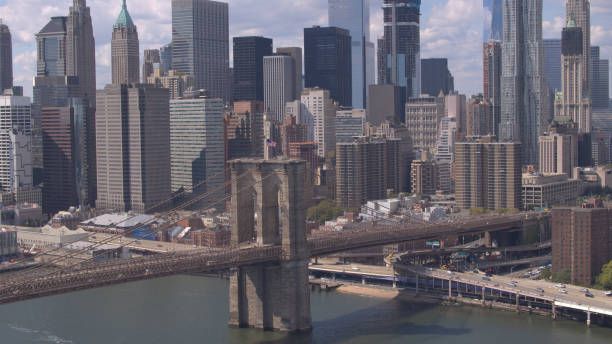 istock AERIAL: Famous Brooklyn Bridge against Lower Manhattan downtown cityscape 1078044500