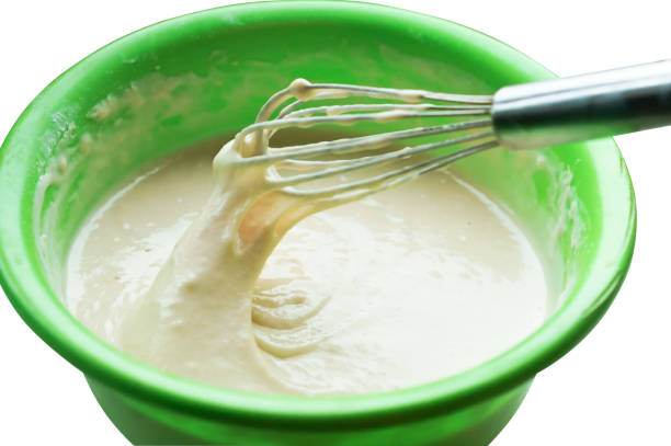 mixing the dough in a green plate