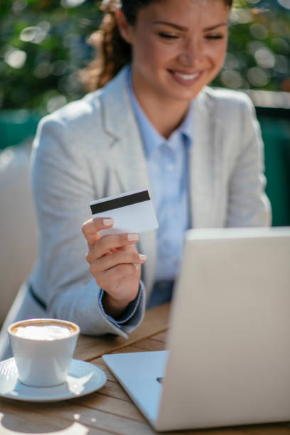 istock Beautiful young woman purchasing online 1078053072