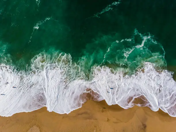 A drone pictures of waves in the sand