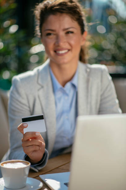 istock Beautiful young woman purchasing online 1078054352