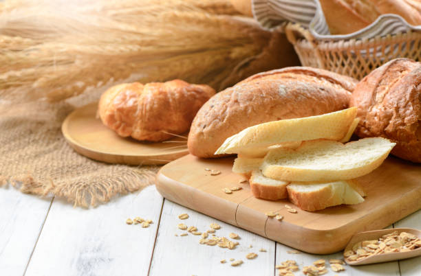 istock bread sliced and croissant on wood 1078058126