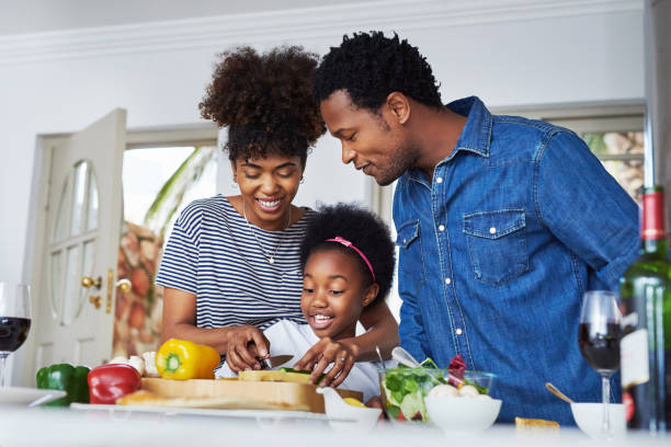 istock Mom is teaching them how to cook 1078059638