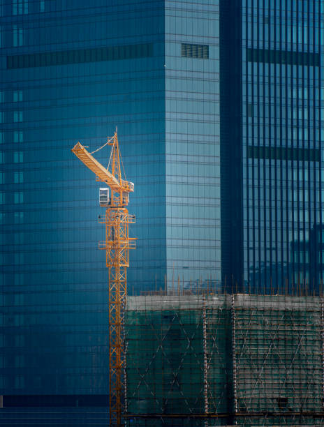 istock Crane for urban high-rise building construction 1078063384