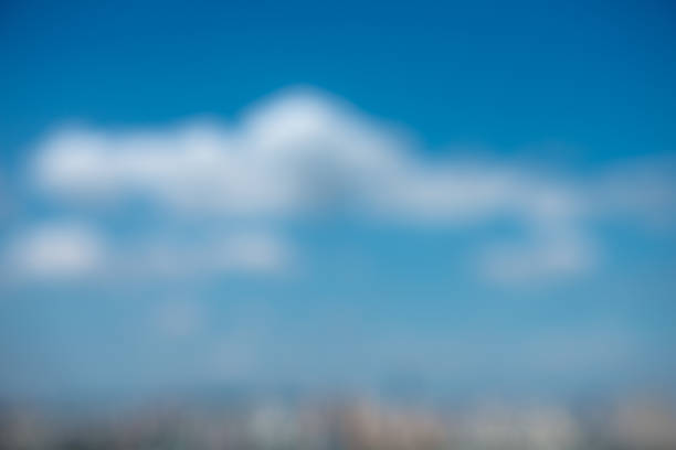 istock White clouds like blue cotton float across the sky. 1078067620