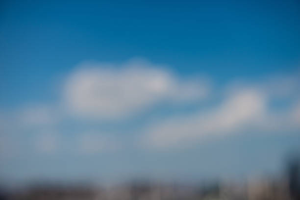 istock White clouds like blue cotton float across the sky. 1078067912