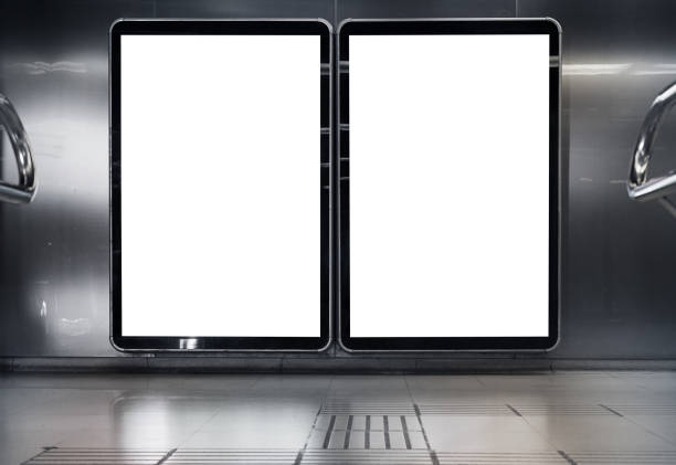 istock Two empty white advertising urban billboard indoor in subway hall, metallic walls, space for design layout. 1078068506