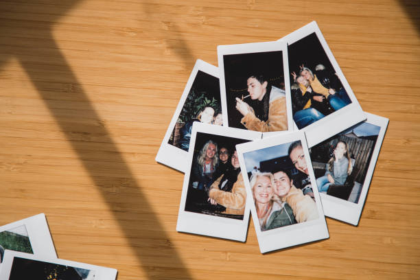 istock Instant Camera Pictures of Friends 1078075652
