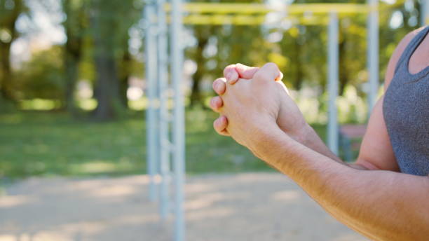 istock Male Athlet does Morning Exercise Outdoors 1078075952