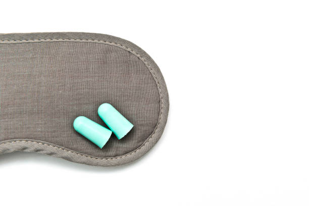 istock General solution for sleep disorder, eye shade, ear plugs and sleeping pills 1078076170