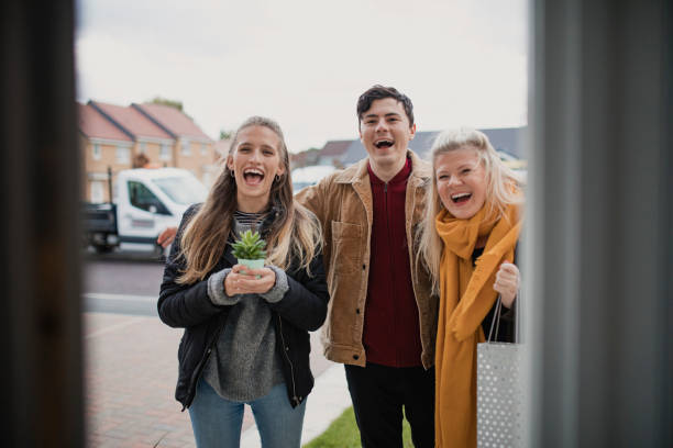 istock Friends Arriving for Social Gathering 1078076954