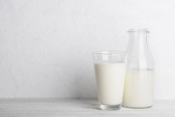 istock Bottle and glass of milk 1078078320