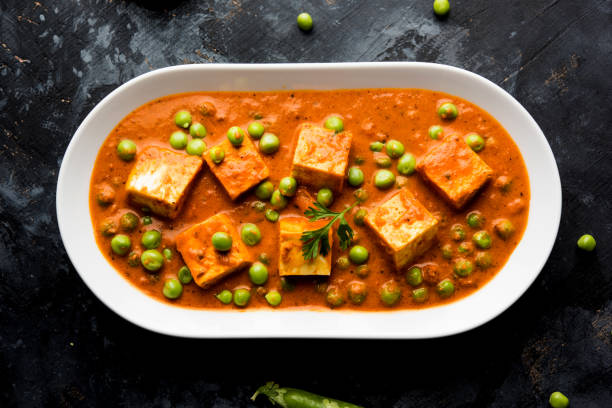istock Green peas or matar paneer curry recipe, served in a bowl. selective focus 1078079010