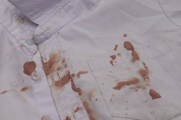 istock bloody white shirt background 1078079266